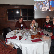 A few photos of the holiday revelers gathered around the five large tables we occupied
