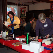 Deb Donovan and Susan Nicholes examining the choices...