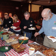 A few shots of the hungry revelers attacking the banquet table