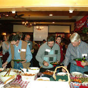 A few shots of the hungry revelers attacking the banquet table