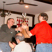 Brian finally gives back the Founder's Trophy he absconded to California with