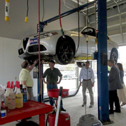 They had put a Giulia on a lift so we could admire its capable underpinnings