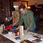 Greg Stidsen examines the door prize offerings...