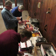 Members perusing the swap meet items