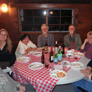 A few shots of the pleased potluck party people seated around the tables