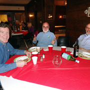 A few shots of the pleased potluck party people seated around the tables