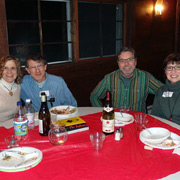 A few shots of the pleased potluck party people seated around the tables