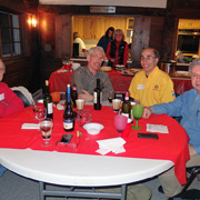 A few shots of the pleased potluck party people seated around the tables