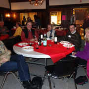 A few shots of the pleased potluck party people seated around the tables