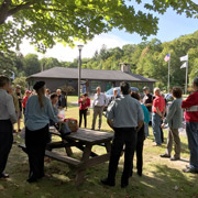 The Donovans gather the assembly for the drivers' meeting