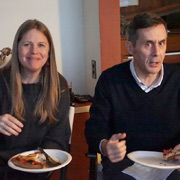 Meg Anderson & Peter Walker with lapsful of pizza