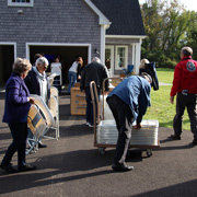 Everyone pitched in to move all of the seating inside the garage for showtime ...