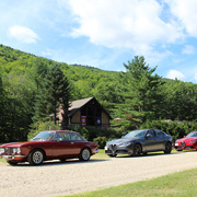 The next morning, our cars lined up and ready to go, with the chalet as a backdrop