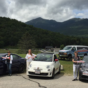 Back at the bottom, the women proudly display our 'This Car Climbed Mount Washington' stickers ...