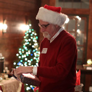 Even Santa Claus gets presents at the AONE Holiday Party