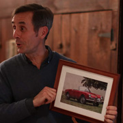... until he arrived at a framed Giulia Spider photo