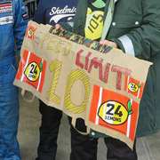 ... until one of our drivers was caught speeding in the paddock and hauled off for some stop & go penalty time, contingent on the rest of our team presenting the marshal with a 'Speed Limit 10mph' sign within 10 minutes. This is our result  the marshal looks skeptical.