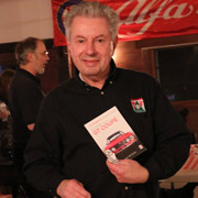 John DeWaele, owner of a red GT coupe, scores a book on red GT coupes!