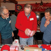 Mike Hollinger, flanked by John Basel and Fran O'Connor