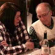 Gene Durso pours a little wine for Lauren DeWaele