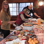 Our buffet table set up and starting to be attacked