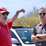 Tom unsuccessfully trying to convince Robert Rook that his Alfa isn't really a Giulia