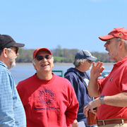 Tom Lesko demonstrates his operatic prowess, to the amusement of the others