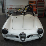 A few shots of the racing Alfas staying out of the occasional drizzle