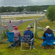 Some people find a good vantage point up on the hill