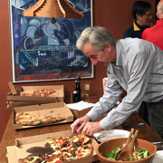 A short while later, Jim grabs one of the few remaining slices