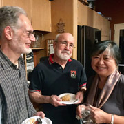 Some photographs are posed, such as this one of Dave flanked by John and Ki Basel ...