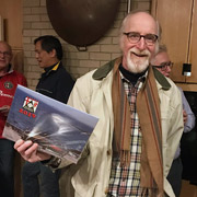 John Rowntree happily grabs a calendar on his way out the door