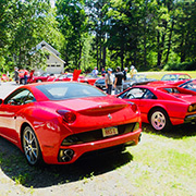 Several photos of the cars (and people) that participated in the event