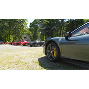 Several photos of the cars (and people) that participated in the event