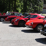 Several photos of the cars (and people) that participated in the event