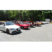 Several photos of the cars (and people) that participated in the event