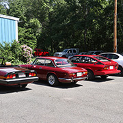 Several photos of the cars (and people) that participated in the event
