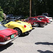 Several photos of the cars (and people) that participated in the event