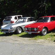 Several photos of the cars (and people) that participated in the event