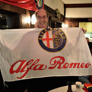 An Alfa Romeo banner is selected by Glenn Randall ...