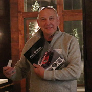 Roger Cassin is happy with the Alfa Romeo history book he found