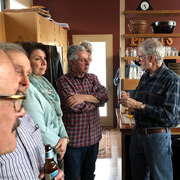 Doug making a point to John; Lauren couldn't care less