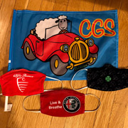 The official flag of the auto tour, and unofficial but essential masks