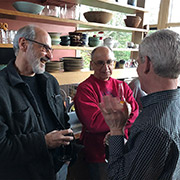 Andy (L) and Dan (R) giving Gene (C) a hard time about the bottle of Corona he's, uhhh, nursing