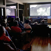... while the theatre patrons finish watching the life of Shelby