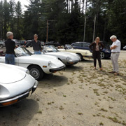 Two silver 1970s Spiders flank another one that was originally also silver