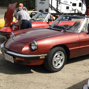 John Lennon's idealism inspires Alfisti in their attempt to track down Larry's idling problem